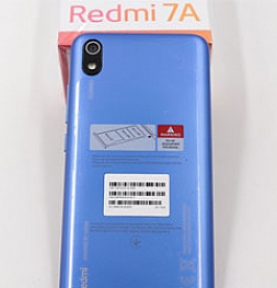 Распаковка яркой новинки в среднем сегменте - Redmi 7A